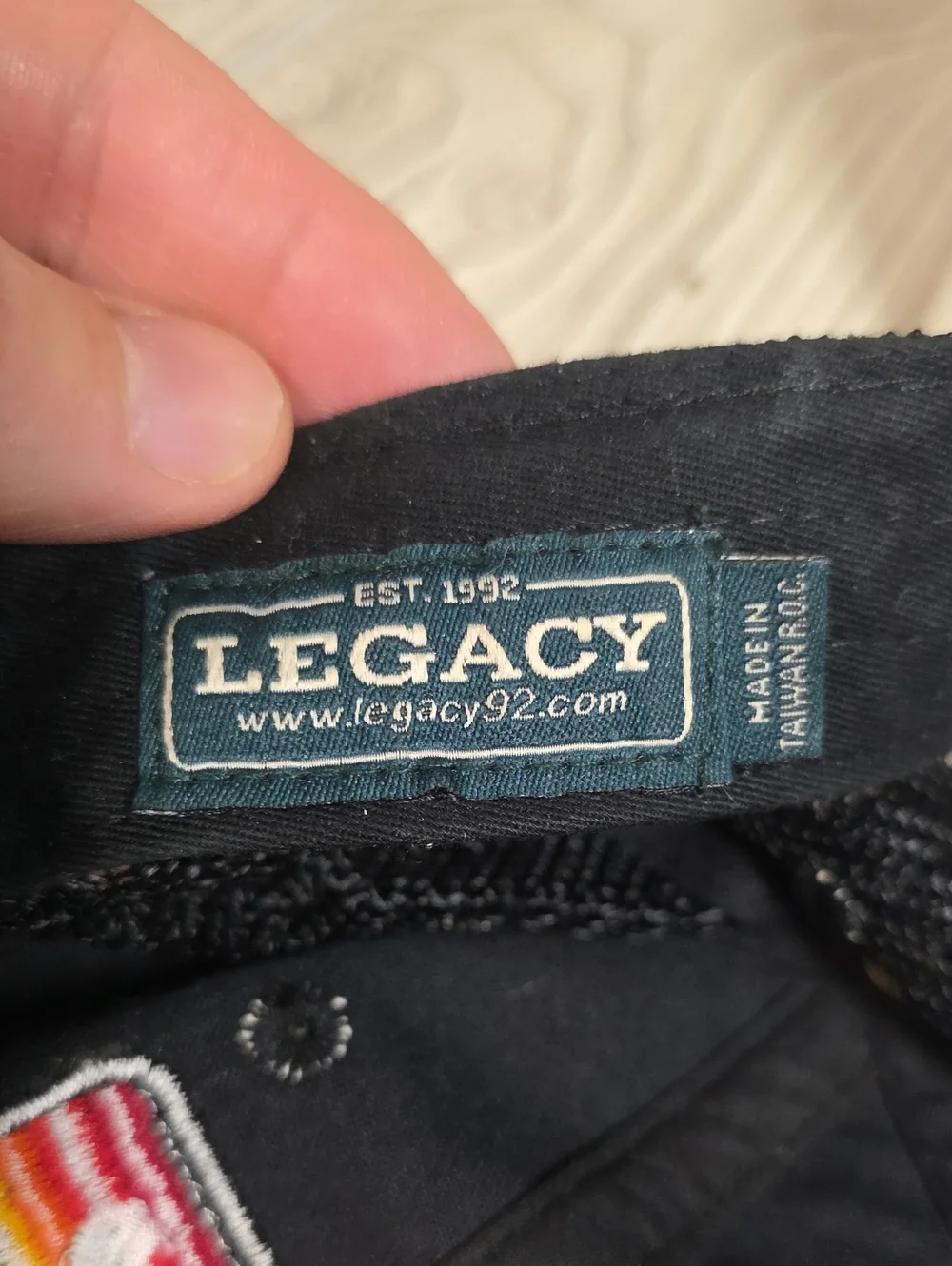 Legacy Crested Butte Faded Black Retro Style Trucker Hat With Patch